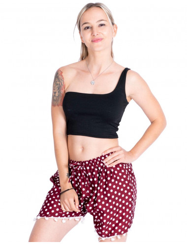 Shorts de bolinhas e pompons