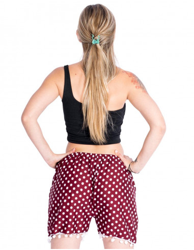 Pantaloncini a pois e pompon