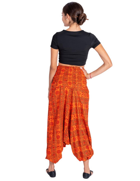 Pantaloni saruel arancioni in stile hippie con simbolo Om in cotone