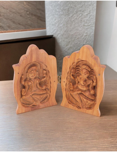 Statue des mains de Hamsa avec Ganesha et Lakshmi sculptées à l'intérieur