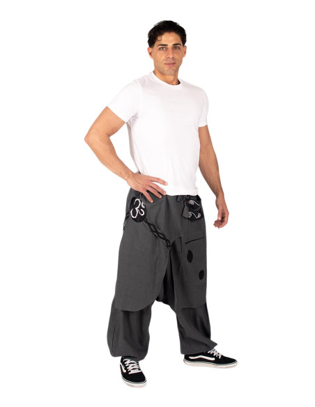 Grey cotton Afghan trousers with asymmetrical hem and Om symbol